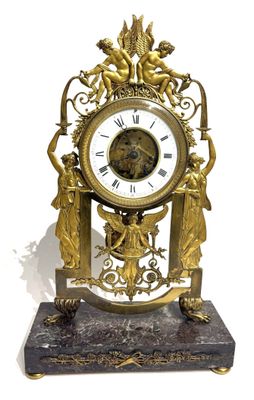 a clock that is sitting on a marble base