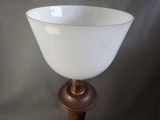 a white bowl sitting on top of a wooden table