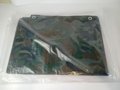 a plastic bag that has a camouflage pattern on it