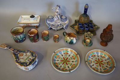 many different types of pottery on the table