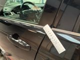 a sticker on the door of a car that says very good