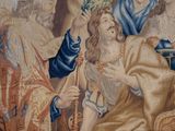 a tapestry with a picture of jesus on it