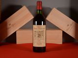 a bottle of wine that is sitting on a table