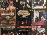 the doors to the doors are covered with posters of the band