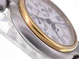 a close up of a wrist watch with a white face