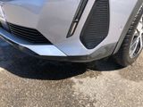 a close up of a car ' s front bumper