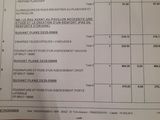 a picture of a tax form on a wooden table