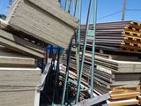 a pile of wood sitting on top of a pile of pallets