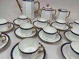 a lot of cups and saucers that are on the table