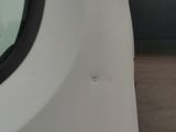 a white van parked on the side of the road