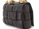 brown leather clutch bag with gold chain handles