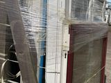 a truck that has been wrapped up with plastic