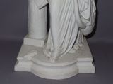 a statue of a woman holding a baby in her arms