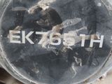 a close up of a broken gas can with the word ek705th written on it