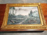 une vieille photo représentant un tableau posé sur une table en bois dans une pièce