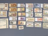 many different types of paper money on the wall
