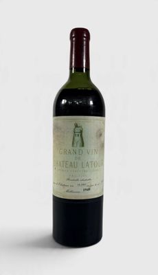 a bottle of wine that is sitting on a table