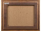 an old wooden frame with a brown canvas backing it