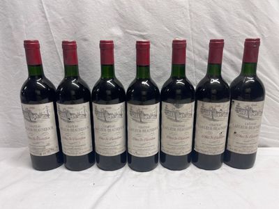 six bottles of wine are lined up in a row