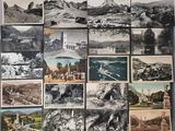 many pictures of a bunch of old photos on the wall