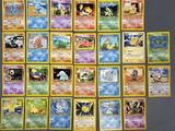 beaucoup de cartes pokemon sur la table