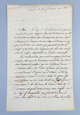 a piece of paper with writing on it sitting on top of a table