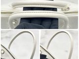 three pictures of a white purse with a black handle and a white handle
