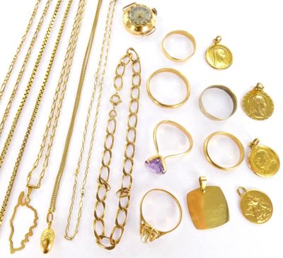 a lot of gold jewelry on a white surface