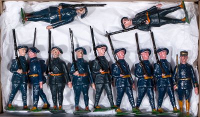 many figurines of men dressed in blue uniforms