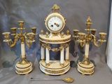 a clock that is sitting on top of a table