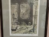 une photo d'un tableau accroché au mur d'un immeuble