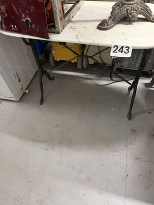 a small table with a starfish on it in a room