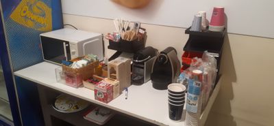a table with a bunch of items on it in a room