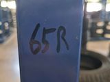 a close up of a blue sign with a clock on it