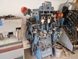a lot of machines that are sitting in a room