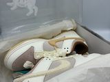 a box with a pair of shoes inside of it