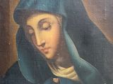an oil painting of a woman with a blue veil