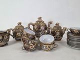 many different types of tea and coffee cups and saucers