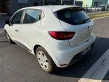a white car that is parked in the parking lot