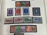 an open book with a bunch of different stamps on it
