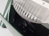 a close up of a machine with a plastic container on it