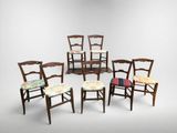 set of six chairs with upholstered seats in the shape of a circle