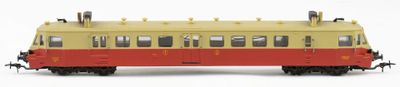a yellow and red train car on a white background