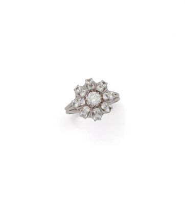 a diamond cluster ring, by van cleef