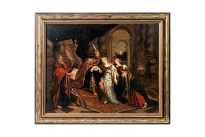 une image représentant un tableau où l'on voit une famille assise sur un canapé