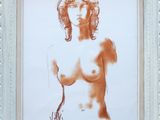 painting of a nude woman in a white frame on a wall