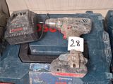 two drillets that are sitting on top of a box