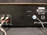 a close up of an electronic device on a black surface