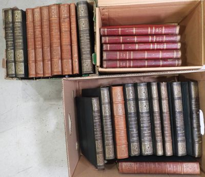 boxes of books are stacked on top of each other on the floor