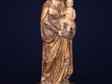 an image of a statue of a woman holding a child